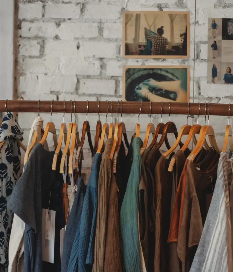 Linen clothing collection on wooden hangers in Springdale, UT